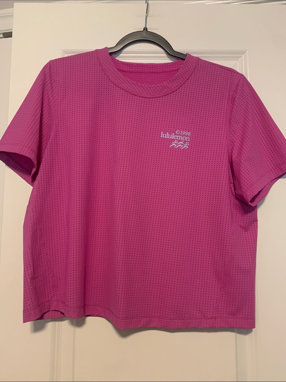 lululemon Pow Pink Perforated Performance Tee
est Sz 8, 21in PTP, Good Condition